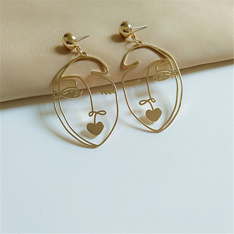 Pre Order:  Wink Face Hollow Earrings